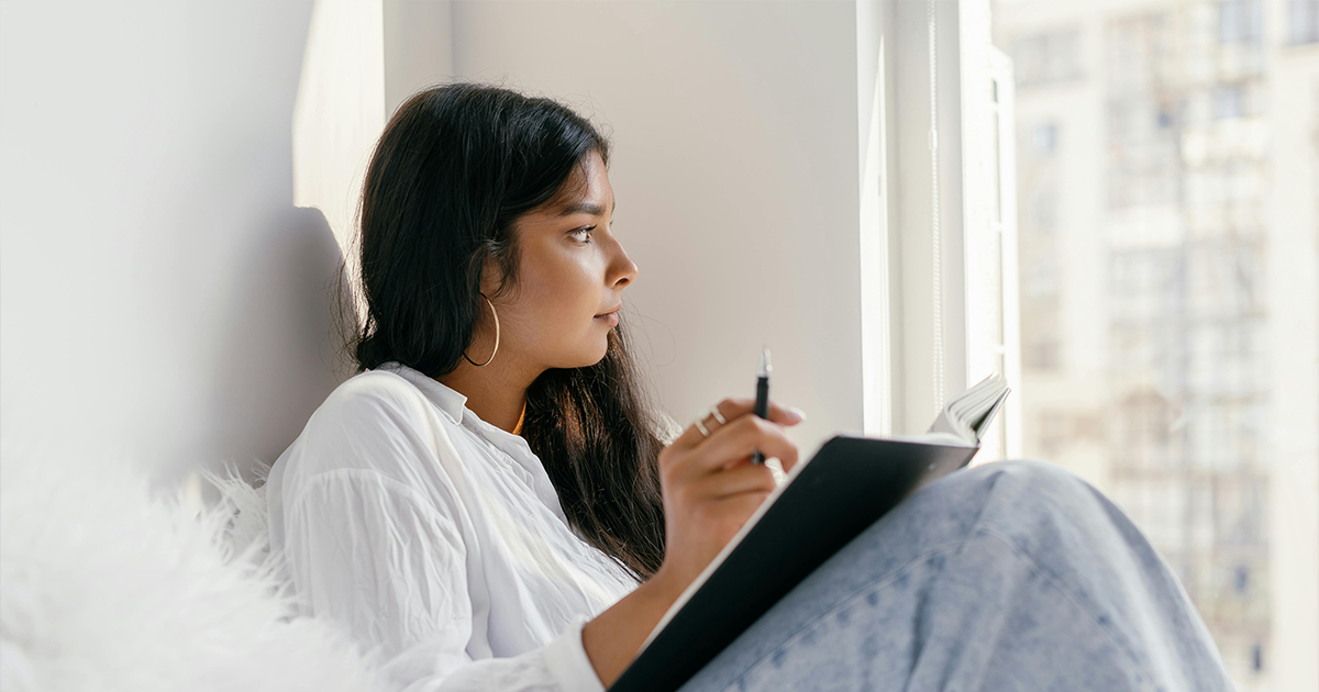 Thoughtful woman learning how pregnancy tests work and when to take one.